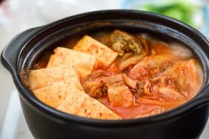 Kimchi stew with tofu in an earthenware