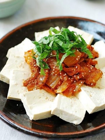 Stir-fried kimchi and pork served with boiled tofu