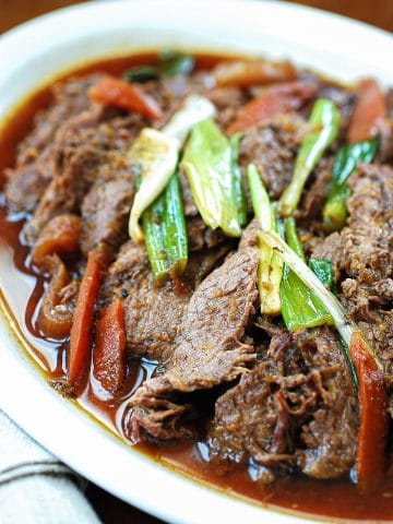 Slow cooker Korean beef bulgogi served in a large plate