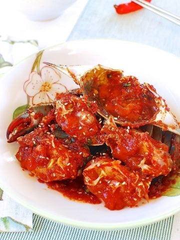 Red spicy marinated raw blue crabs